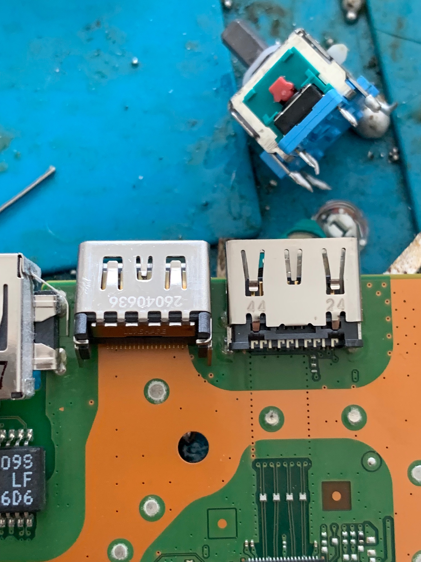 Damaged PS5 HDMI port before board-level repair